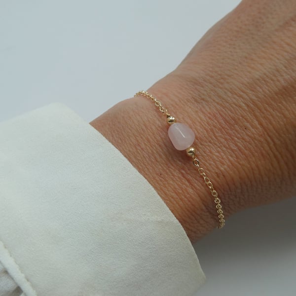 Gold chain and rose quartz gemstone bracelet