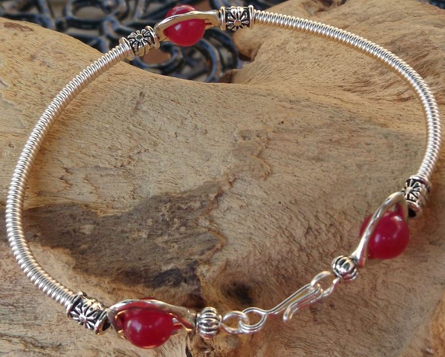 7.5" silver plated bracelet with silver plated gizmo wire cover with rose jade