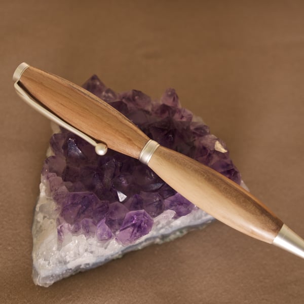 Yew wood rollerball twist pen made on Orkney, R6,4