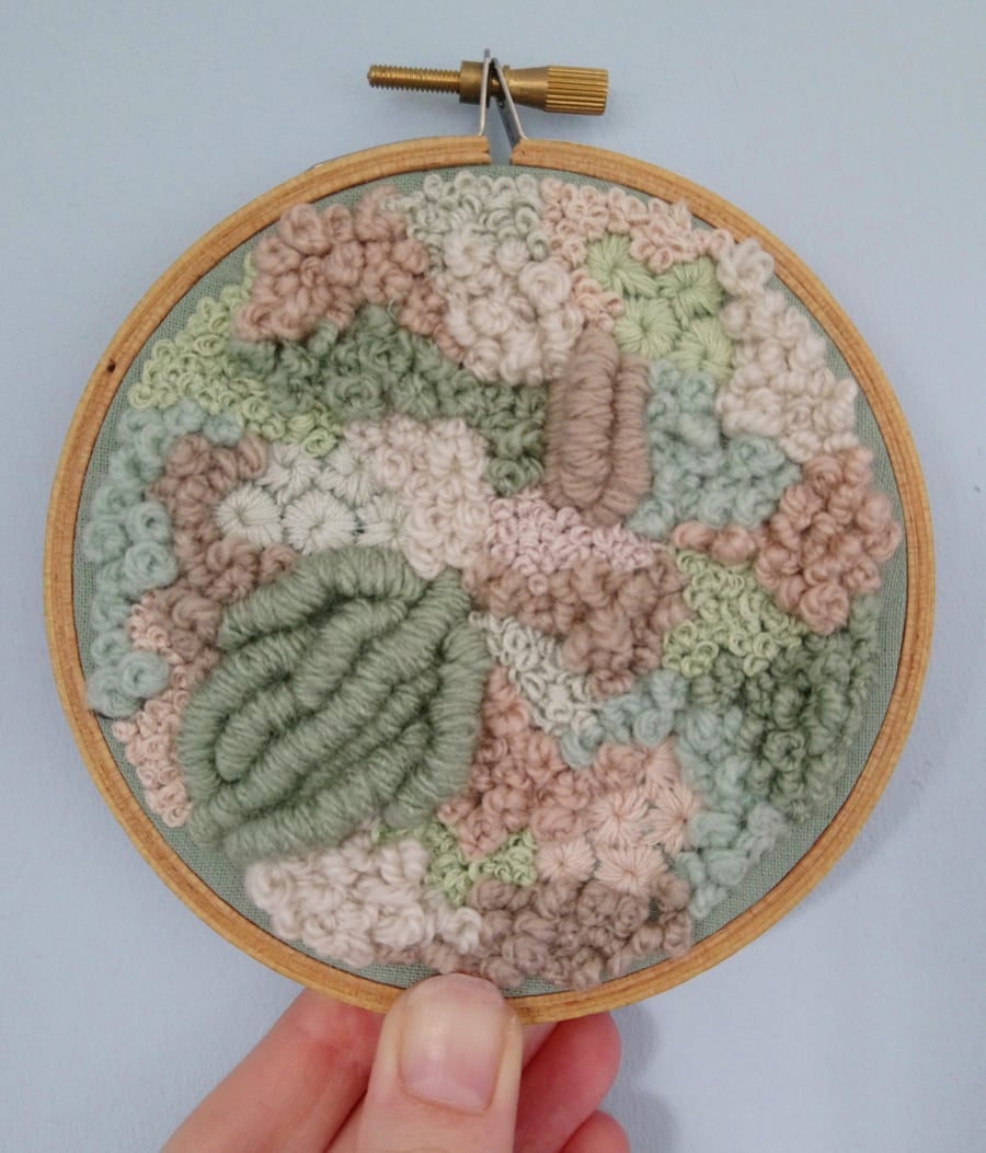 Earth a hand embroidered home decor art piece 