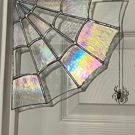 Large stained glass Spider web decoration with a hanging silver spider 10" x 10"