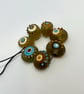 Handmade brown, ivory and turquoise patterned lamp work glass beads - Image 3