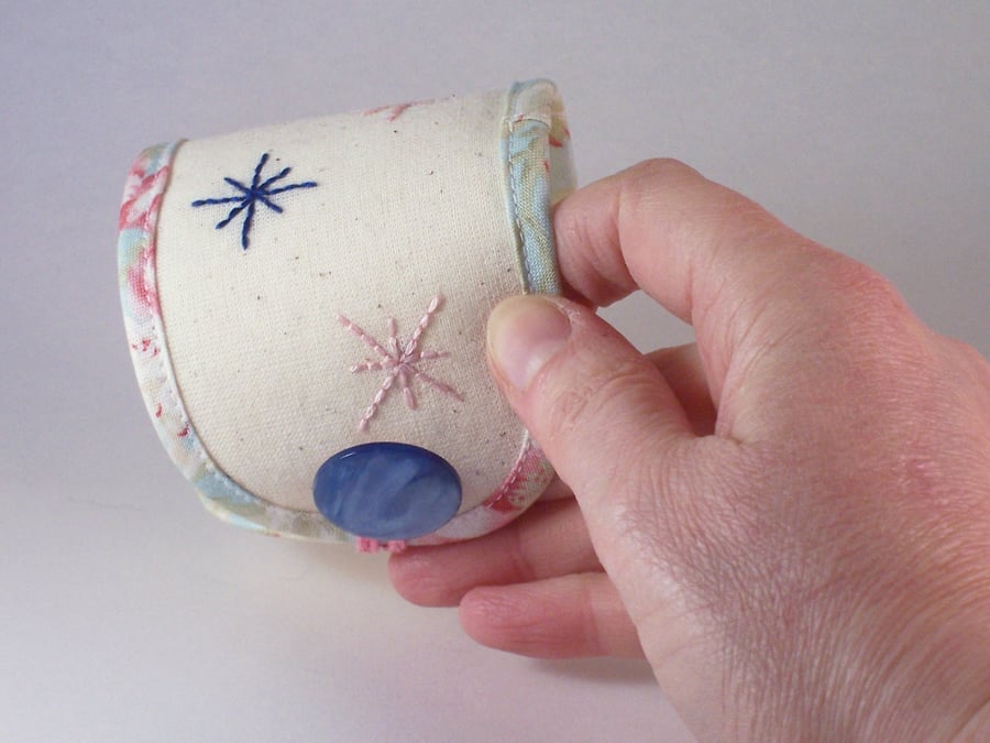 Hand embroidered fabric cuff 