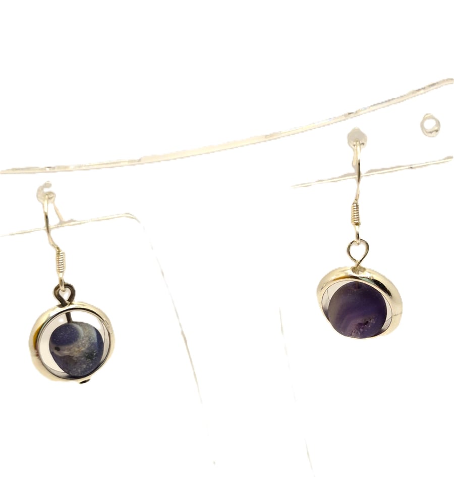 Ladies blue druzy bead drop earrings set in silver coloured rings