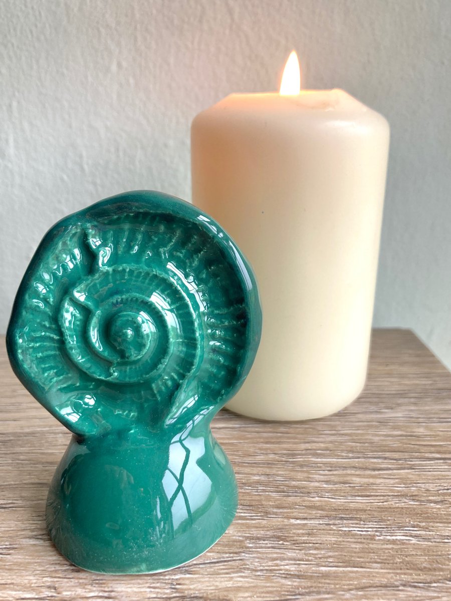 Ammonite candle snuffer ornament