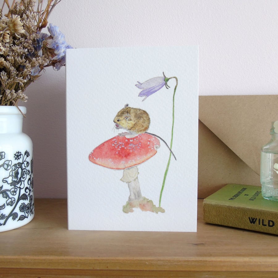 Field mouse on toadstool Greetings card