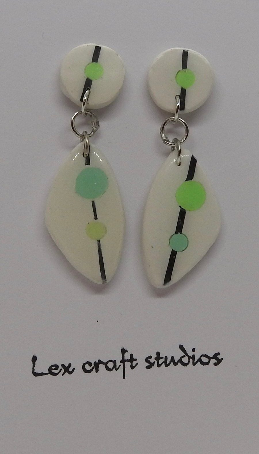 Green spot ceramic earrings 