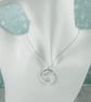 Silver Circle Necklace with 'Eternal Love' Message Inside - Image 5