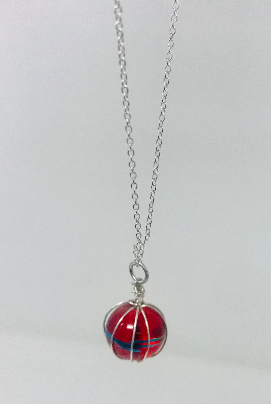 Glass ball wrap in silver wire necklace 