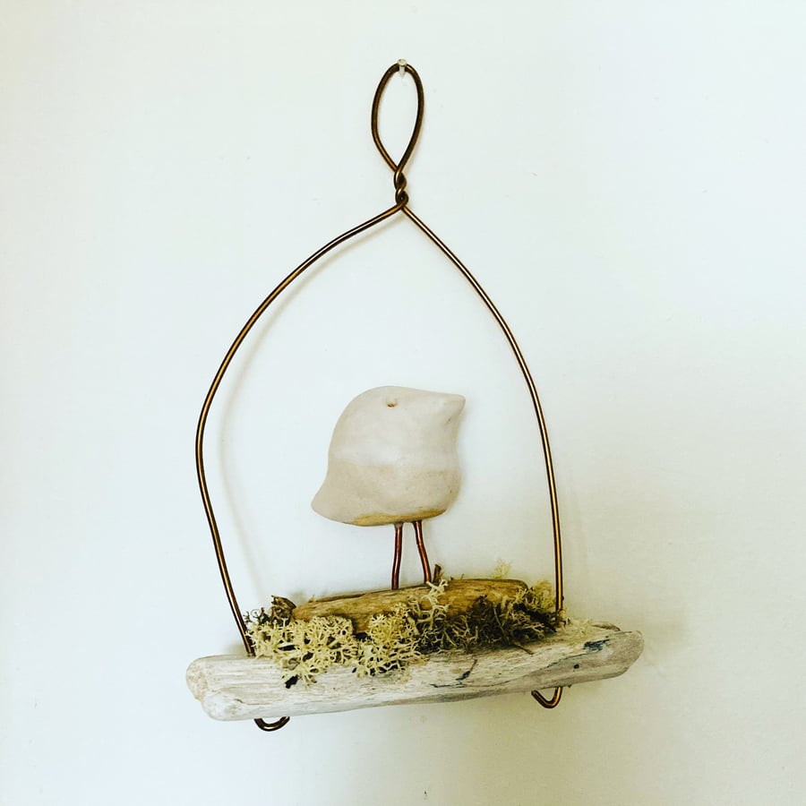 Wire art, bird on a driftwood wire, wire sculpture