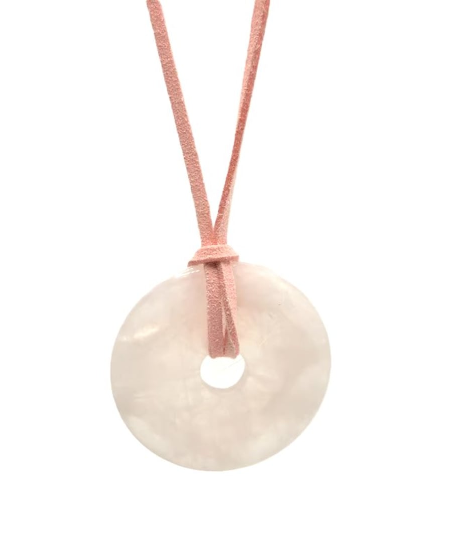 Large rose quartz donut pendant with pink faux leather cord