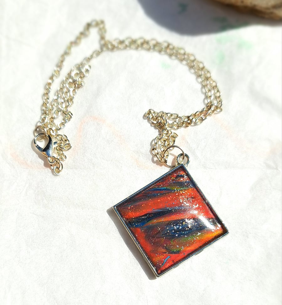 Silver plated chain necklace with a polymer clay filled bezel