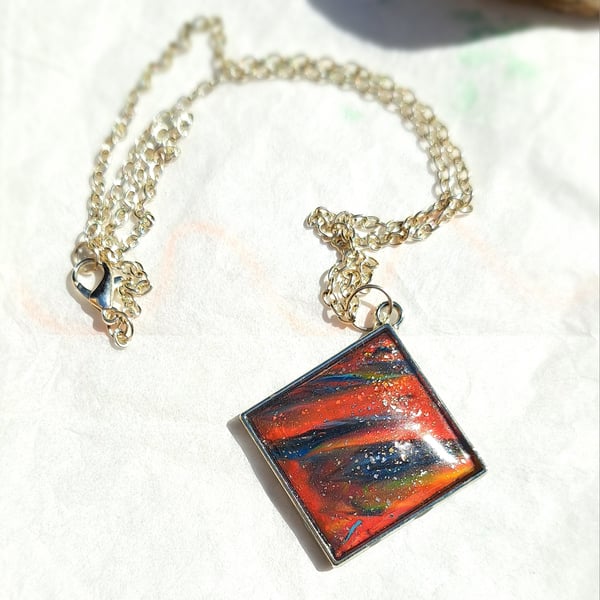 Silver plated chain necklace with a polymer clay filled bezel