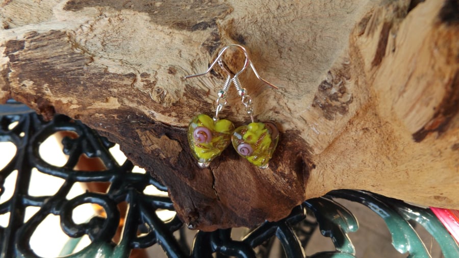 Glass heart shaped yellow earrings with pink rose motif 
