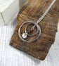 Circles Necklace. Recycled Sterling Silver Pebble with Carnation and Garnet - Image 6