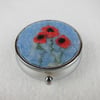 Pill box with felted poppy decoration, circular