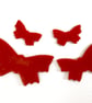 Four red Butterflies made with Bullseye 90coe glass