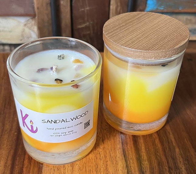 Sandalwood soy wax candle in a glass jar & decorated with real crystals