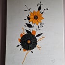 Orange and black flowers on a contrasting background. 