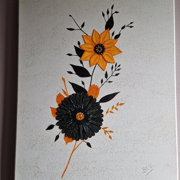Orange and black flowers on a contrasting background. 
