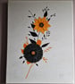 Orange and black flowers on a contrasting background. 