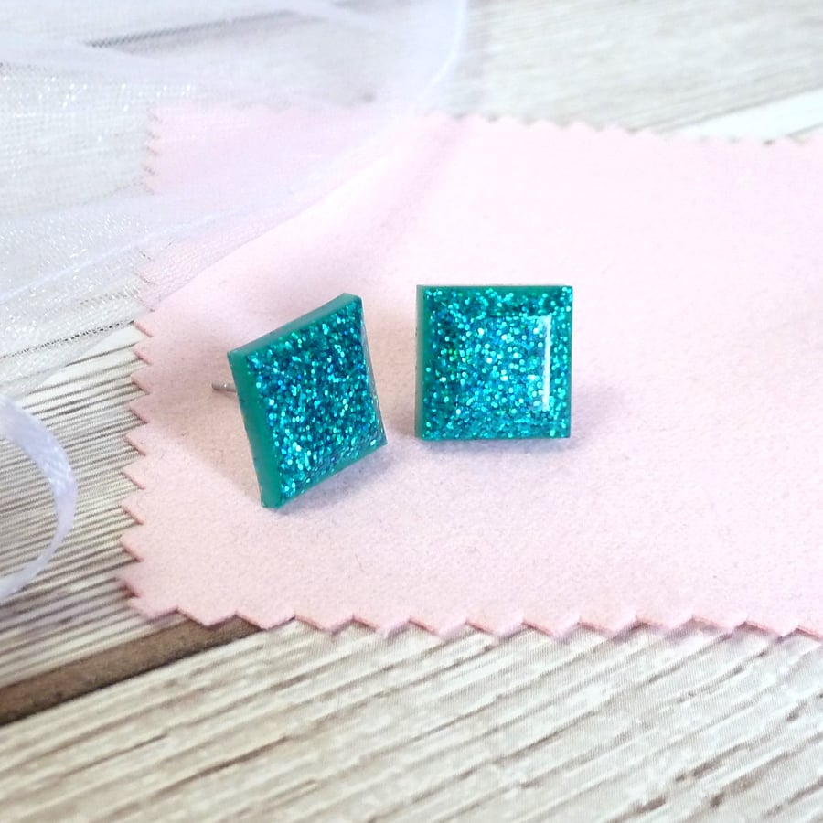 Turquoise glitter square studs. Bright turquoise sparkly earrings for women