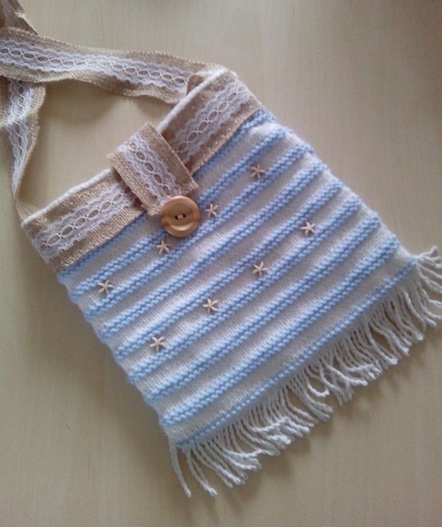 hand knitted shoulder bag.