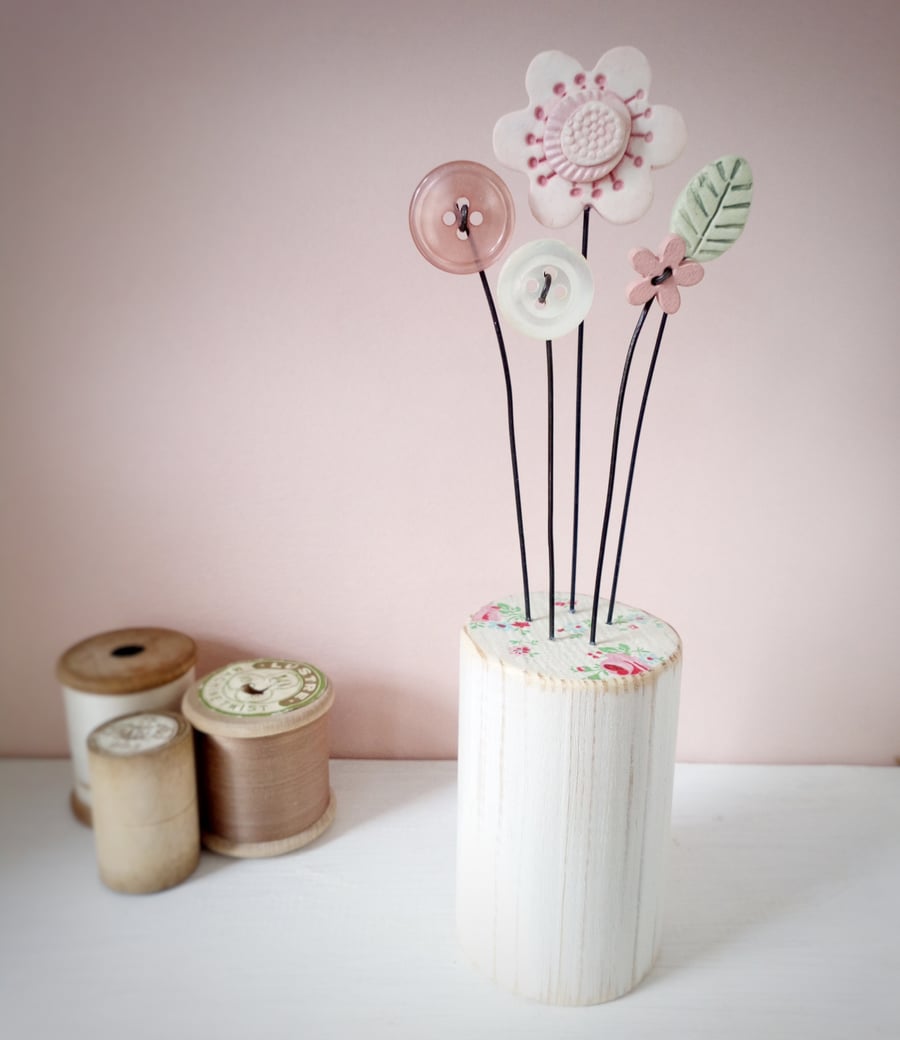 Clay and button flower garden 