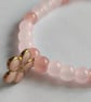 Pink Glass Bead Bracelet with Flower Charm - Image 1