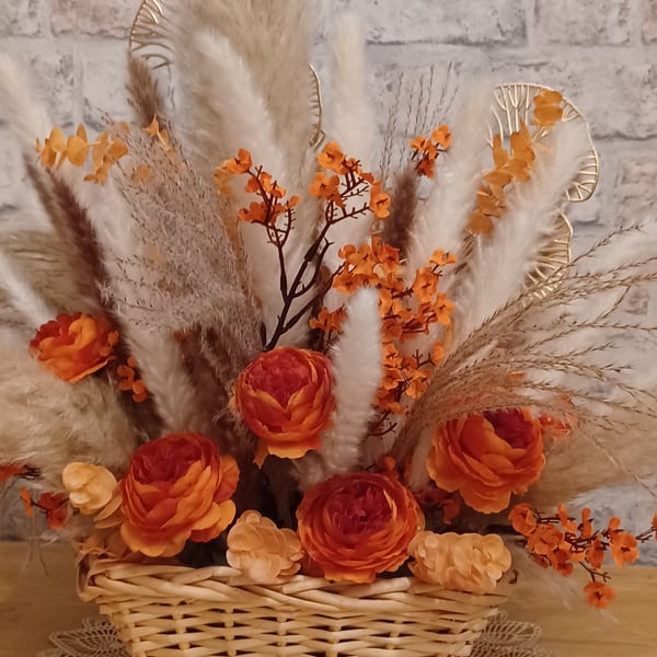 Fiery orange fireplace  flower arrangement