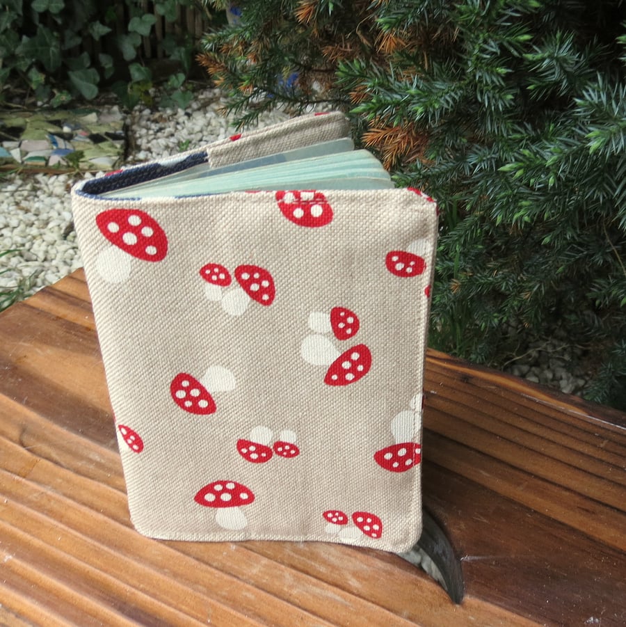 Toadstools.  A whimsical passport sleeve.  Passport cover.