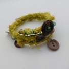 Lime green memory wire fabric bracelet with buttons 