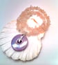 Iridescent Lilac Ceramic Donut Pendant on a Rose Quartz Chip Bead Necklace - Image 1