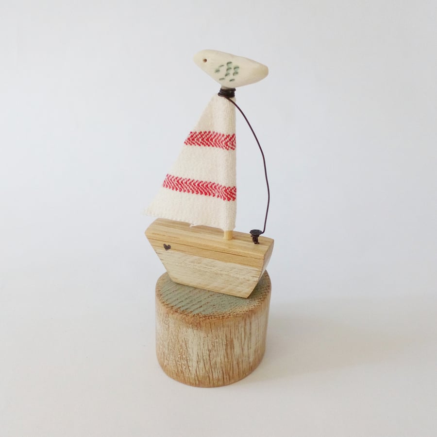 SALE - Handmade little wooden sail boat with clay bird