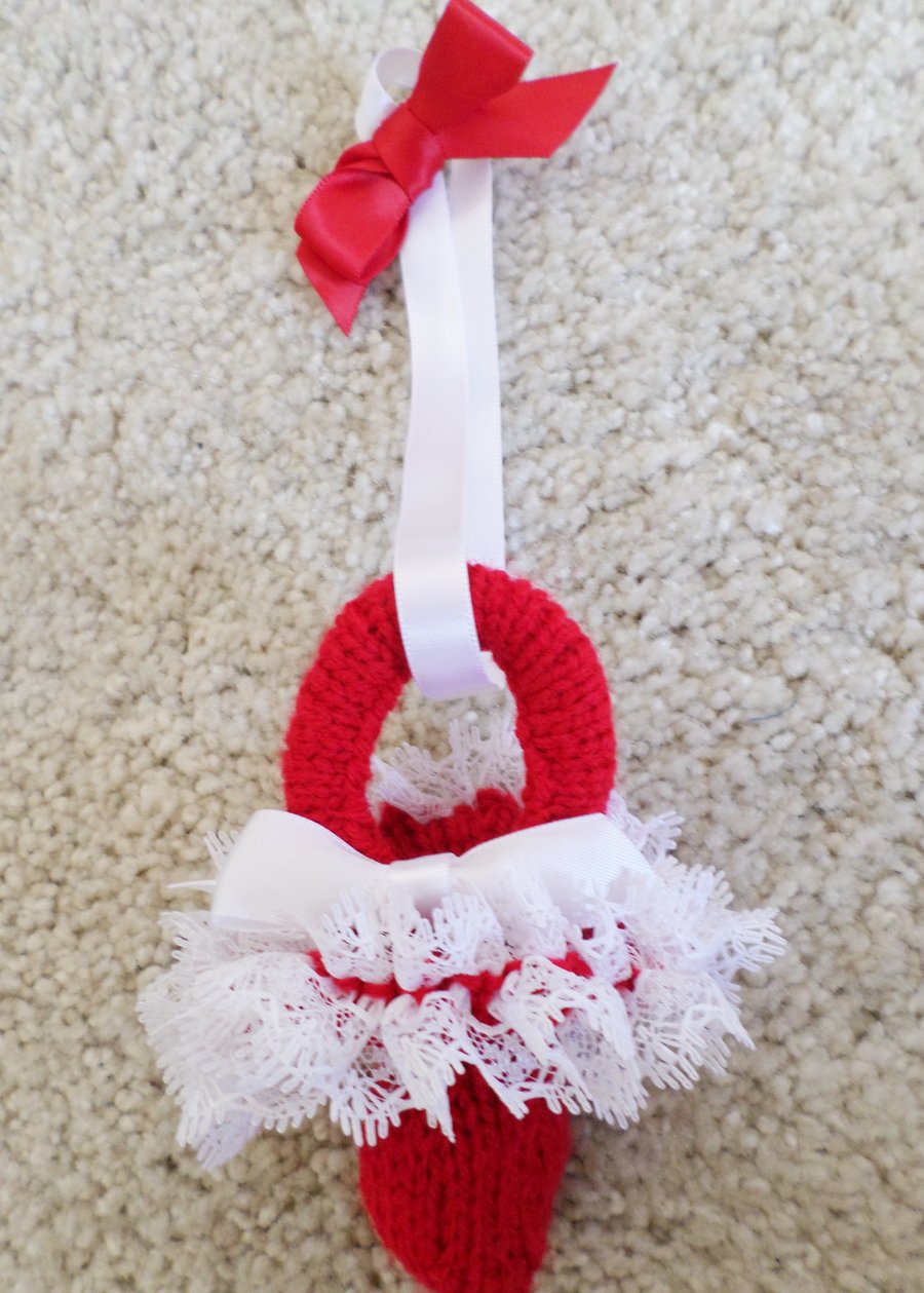 Red pram decoration hand knitted baby dummy shape