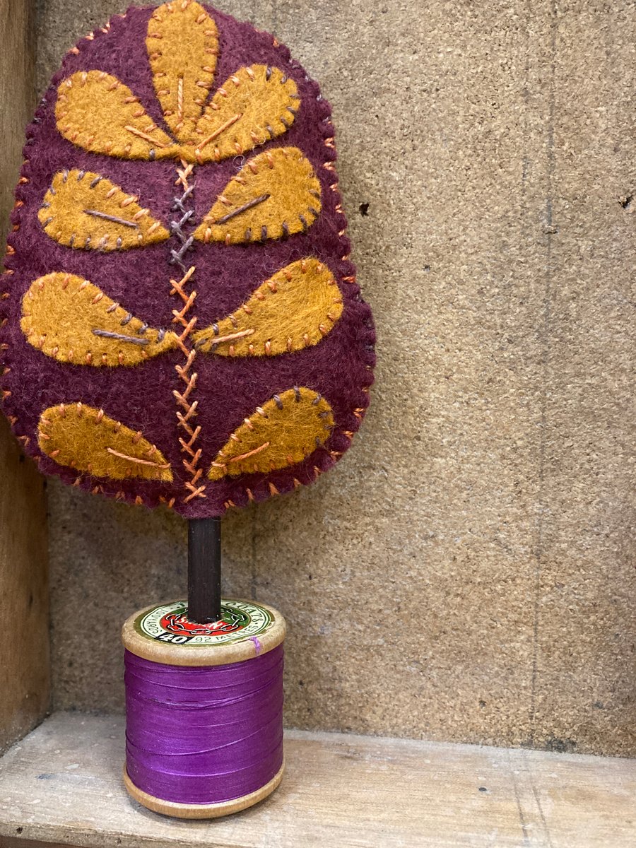 Plum tree with gold leaves