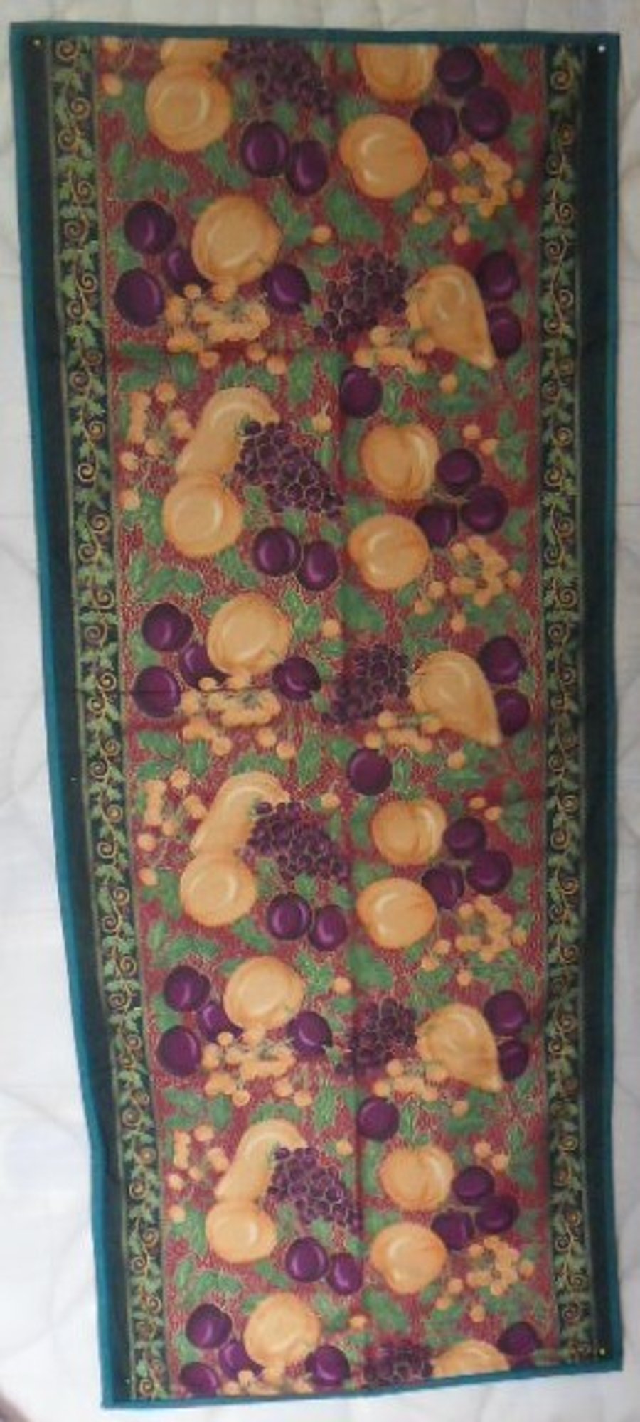Christmas plums and holly table runner. 100% cotton fabric