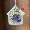 Small Ceramic bird house decoration with turquoise flower