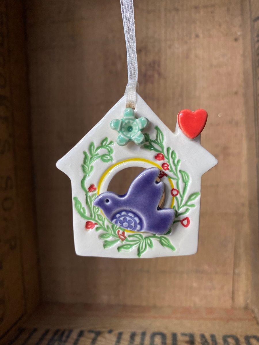 Small Ceramic bird house decoration with turquoise flower