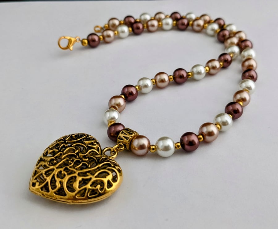 Brown and white glass pearl necklace with gold heart pendant 1002661H