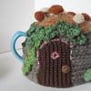 Crochet fairy door tea cosy