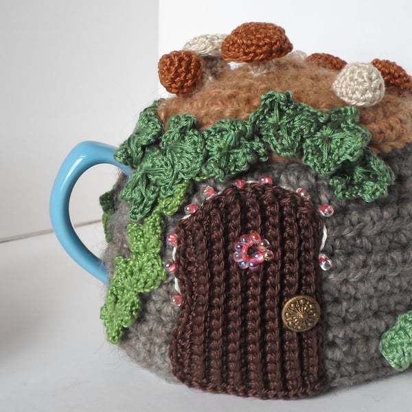 Crochet fairy door tea cosy