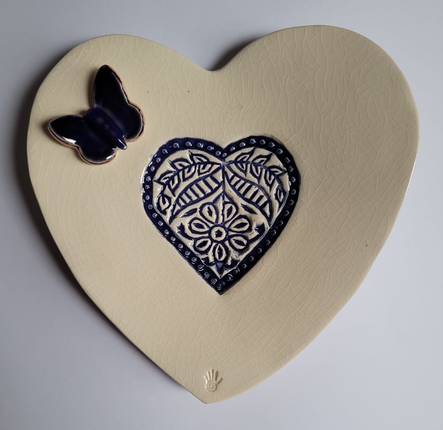 Embossed heart dish with butterly