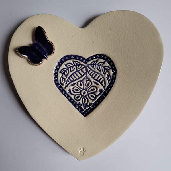 Embossed heart dish with butterly