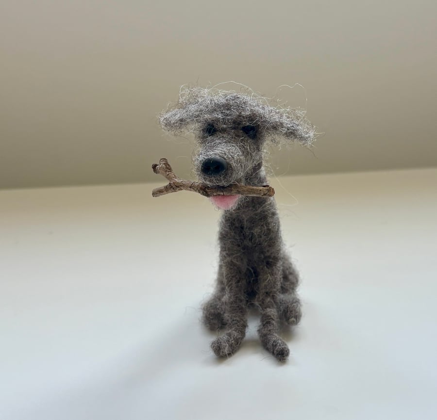 Needle felt whimsical dog fetching a stick. 9 cm tall 