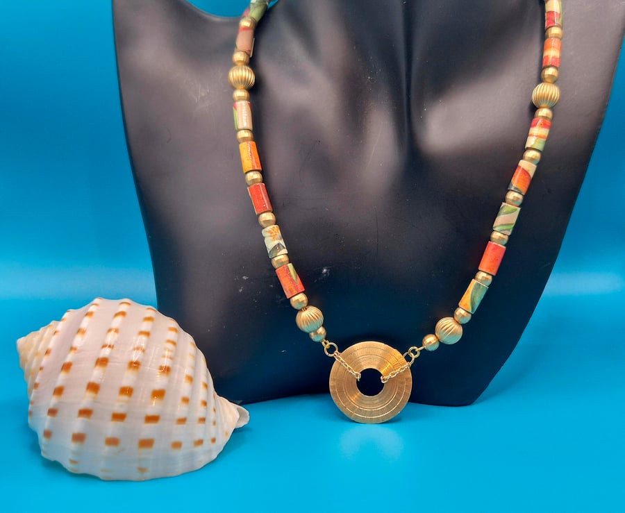 Gorgeous green and orange necklace made with a recycled soap wrapper