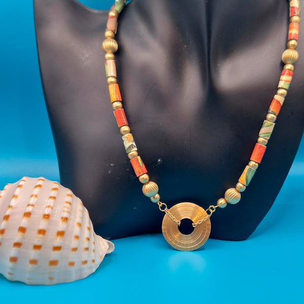 Gorgeous green and orange necklace made with a recycled soap wrapper