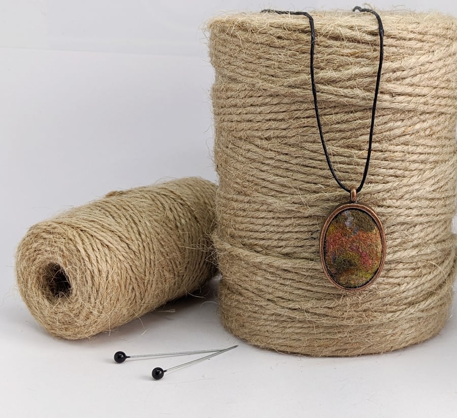 Felted pendant - autumnal shades in copper bezel
