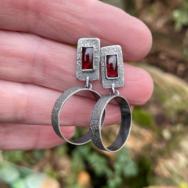 Oxidised textured silver and garnet stud earrings with hoop dangle