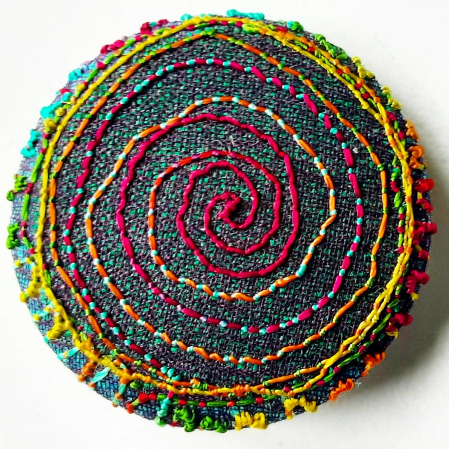 One Inch Badge Multicoloured Spiral Badge 